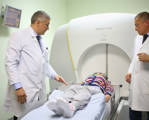 Gamma knife cancer treatment - doctors prepares the patient for the procedure