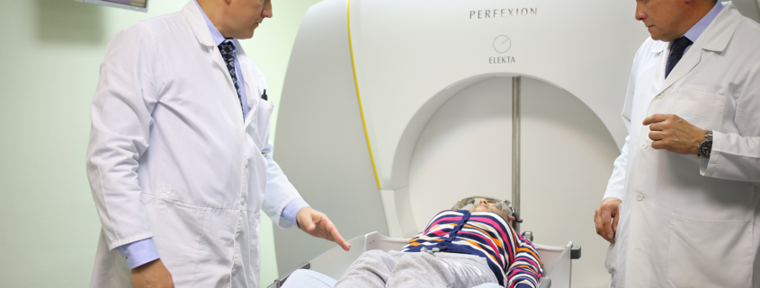 Gamma knife cancer treatment - doctors prepares the patient for the procedure