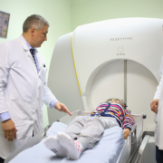 doctors prepares the patient for the procedure on the Gamma Knife