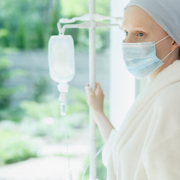 Radiotherapy centre - woman with drip