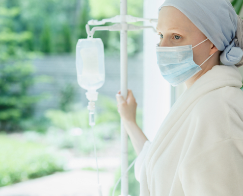 Radiotherapy centre - woman with drip