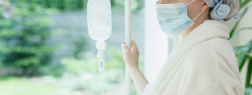 Radiotherapy centre - woman with drip