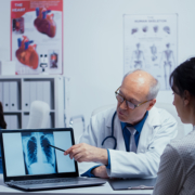 radiotherapy centre - doctor talking with patient about lungs