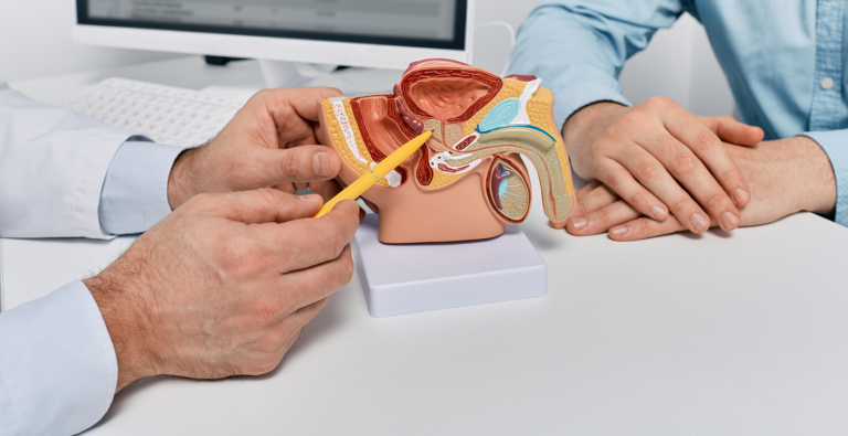 Radiotherapy Centre - Doctor consulting man patient with suspected prostate cancer