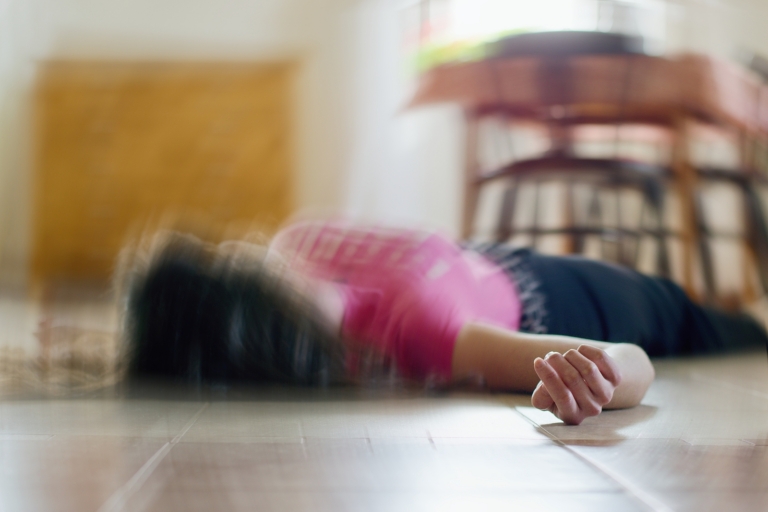 external radiation - Woman lying on the floor at home