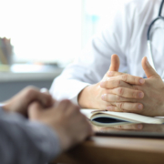 radiotherapy centre austria - Male doctor giving a consultation to a patient