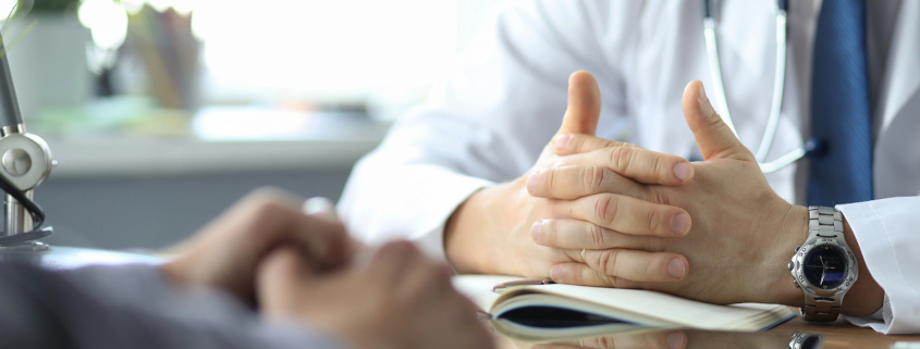 radiotherapy centre austria - Male doctor giving a consultation to a patient