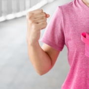 radiotherapy centre- Woman in pink T- shirt with Pink Ribbon